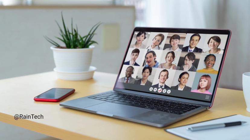 A Laptop on a desk showing a remote team video conference with diverse professionals, symbolizing global collaboration and remote hiring.