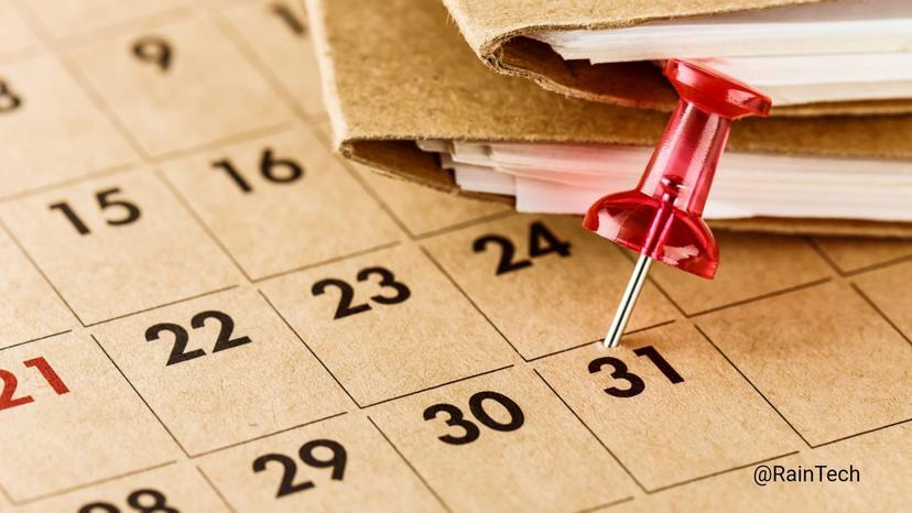 A calendar with a red pushpin on the 31st, representing RainTech’s 30-day timeline to hire a developer squad in Indonesia.